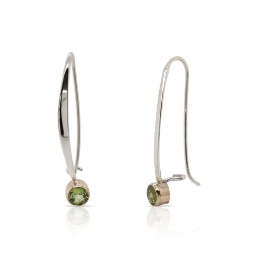 This pair of Sway peridot earrings by Ed Levin is crafted from sterling silver and 14k yellow gold and features round peridots.