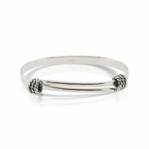 This Signature bracelet by Ed Levin is crafted from sterling silver and features a nautical theme.
