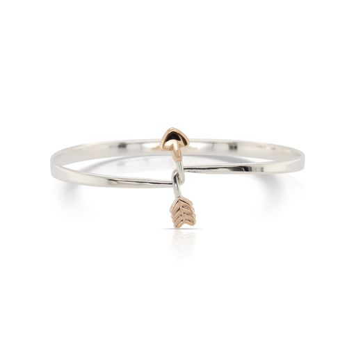 This Free Spirit bracelet by Ed Levin is crafted from sterling silver and features a 14k yellow gold arrow.