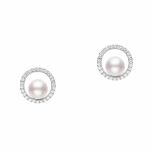 This pair of diamond and pearl earrings by Mikimoto is crafted from 18k white gold and features 6mm white pearls and 0.26 total carats of diamonds around the halo.
