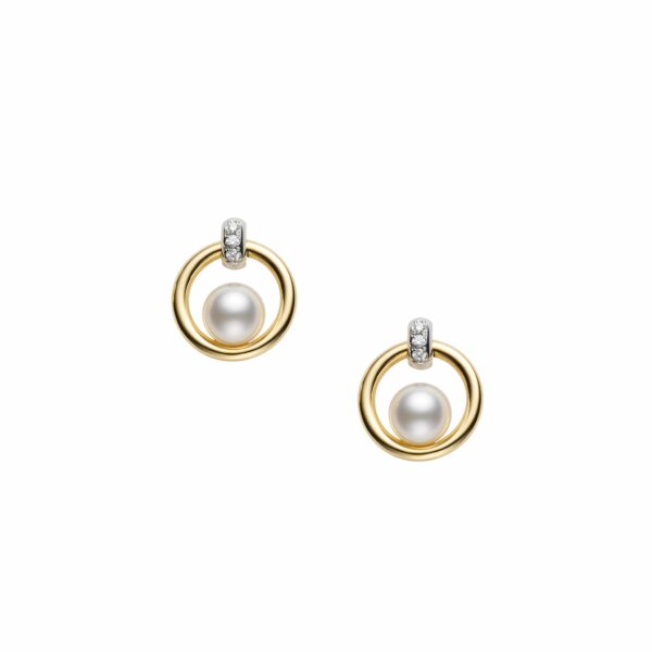 This pair of pearl and diamond cradle earrings by Mikimoto is crafted from 18k yellow gold and features 5.5mm Akoya pearls and 0.02 total carats of diamonds.