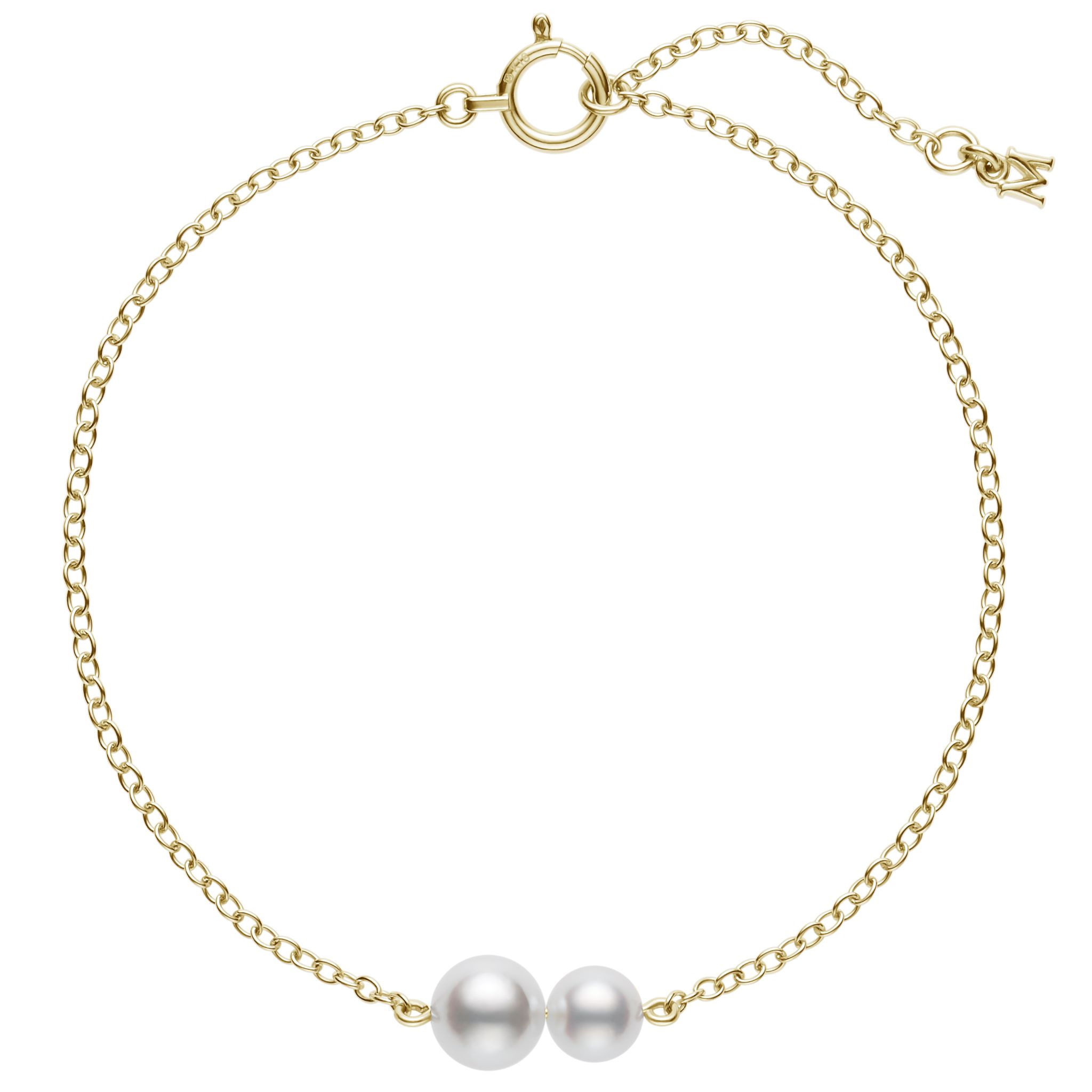 This pearl bracelet by Mikimoto is crafted from 18k yellow gold and features a 5mm white pearl and a 6mm white pearl. This bracelet is adjustable 6.25" or 7" long.
