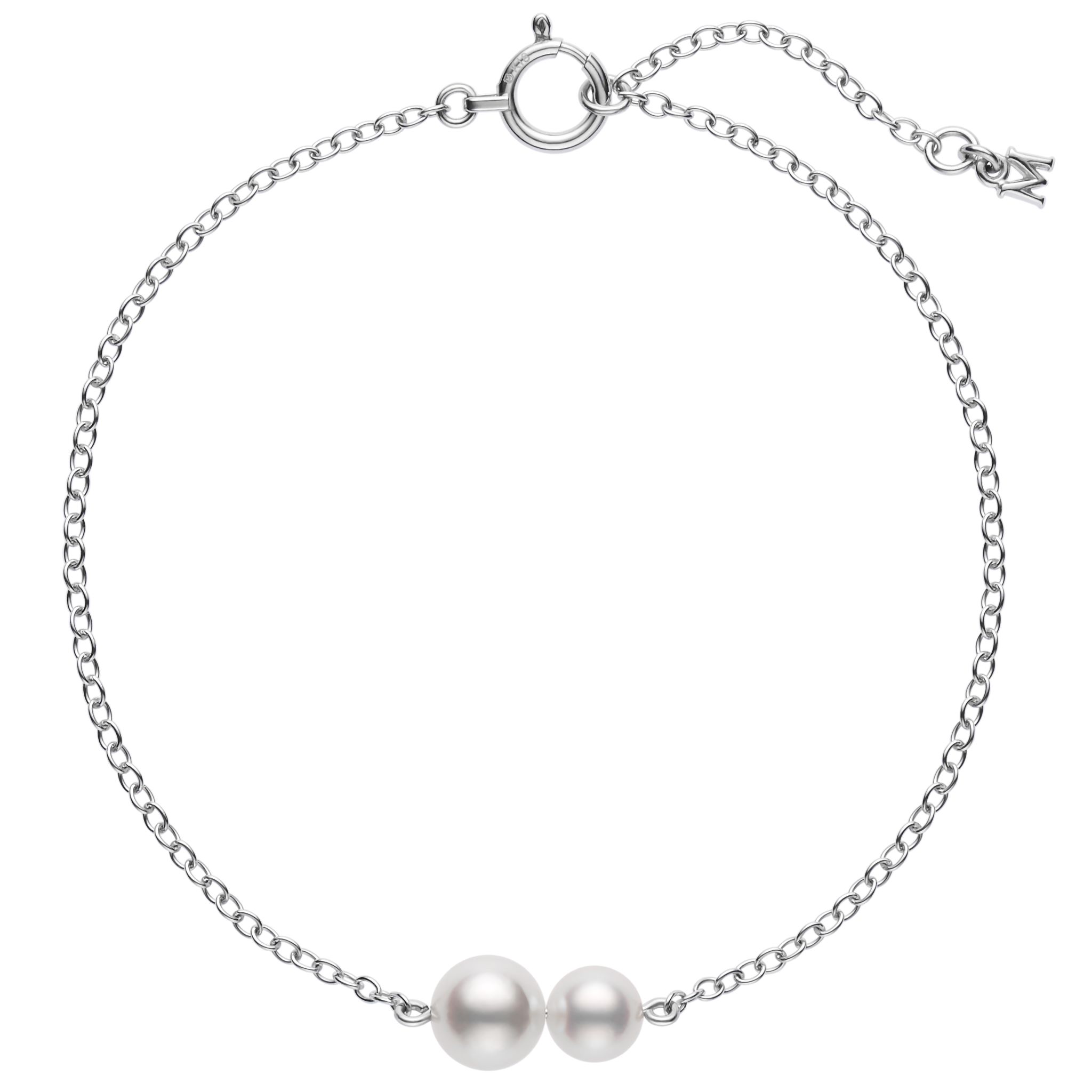This pearl bracelet by Mikimoto is crafted from 18k white gold and features a 5mm white pearl and a 6mm white pearl. This bracelet is adjustable 6.25" or 7" long.