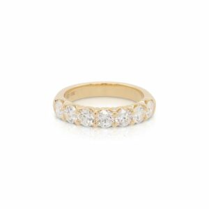 This diamond band is crafted from 18k yellow gold and features 1.47 total carats of diamonds.