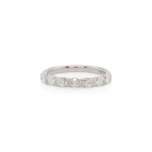 This diamond band is crafted from 18k white gold and features 0.70 total carats of diamonds.