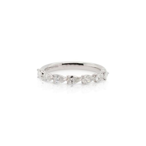 This 7 stone diamond band by Alyssa is crafted from 18k white gold and features 0.70 total carats of pear shaped diamonds.