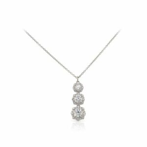 This necklace by Forevermark is crafted from platinum and features 1.00 total carats of center diamonds and 0.28 total carats of diamonds around the halos.