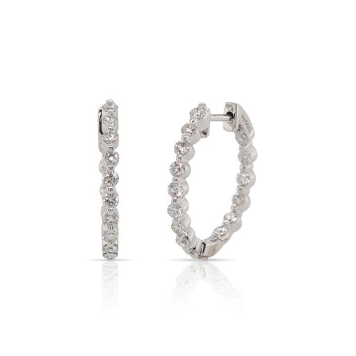 This pair of diamond hoop earrings by Forevermark is crafted from 18k white gold and features 1.02 total carats of diamonds.