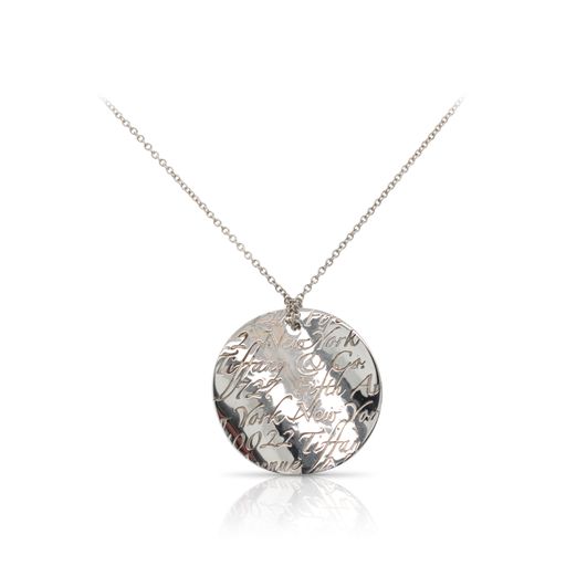 This necklace by Tiffany & Co. is crafted from sterling silver and features engraved "notes".