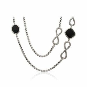 This necklace by David Yurman is crafted from sterling silver and features black onyx stations and infinity symbols