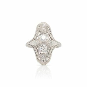 This ring is crafted from 18k white gold and features 0.40 total carats of diamonds set in a filigree mounting.