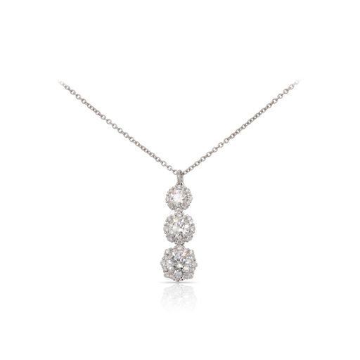 This necklace by Forevermark is crafted from platinum and features 1.09 total carats of gradient diamonds and 0.27 total carats of diamonds around the halos.