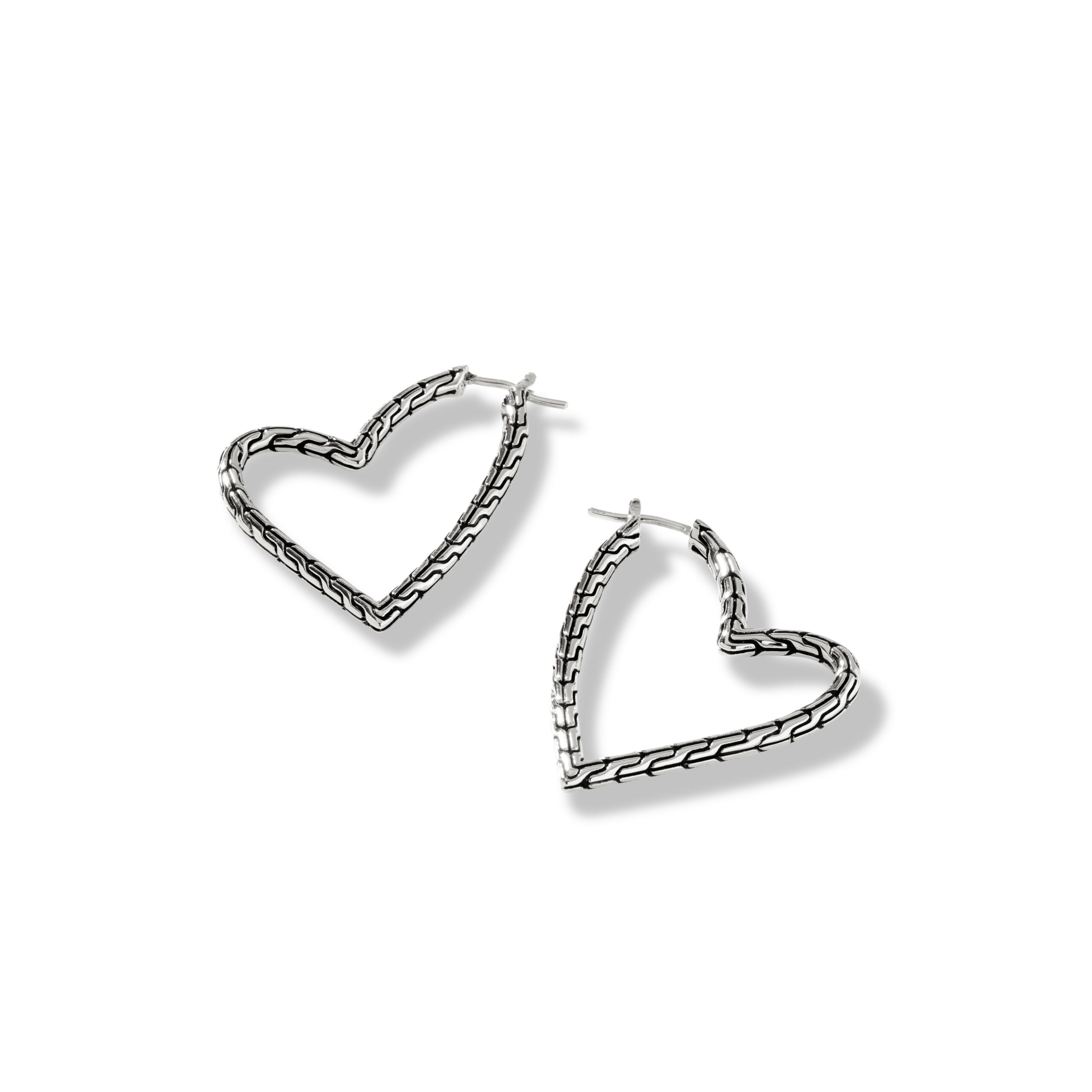 This pair of earrings by John Hardy is crafted from sterling silver and are heart shaped.