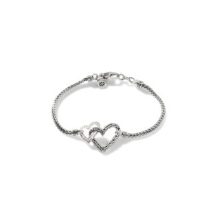 This bracelet by John Hardy is crafted from sterling silver and features 0.11 total carats of diamonds in the smaller heart.