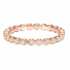 This ring by Goldman is crafted from 14k rose gold and features 0.24 total carats of bezel set diamonds.