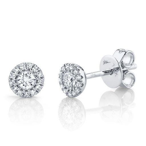 This pair of earrings is crafted from 14k white gold and features 0.24 total carats of diamonds.