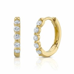 This pair of earrings is crafted from 14k yellow gold and features 0.24 total carats of diamonds.