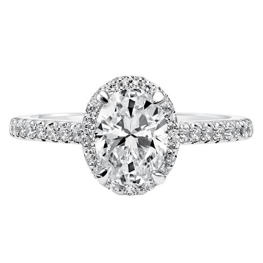 This engagement ring mounting by Goldman is crafted from 14k white gold and features 0.36 total carats of diamonds along the sides and around the halo. The center diamond is chosen separately.