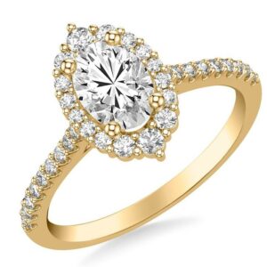 This engagement ring mounting by Goldman is crafted from 14k yellow gold and features 0.39 total carats of diamonds along the sides and around the halo. The center diamond is chosen separately.