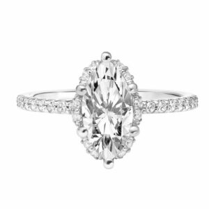 This engagement ring mounting by Goldman is crafted from 14k white gold and features 0.24 total carats of diamonds along the sides and around halo. The center diamond is chosen separately.