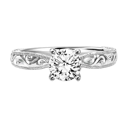 This engagement ring mounting by Goldman is crafted from 14k white gold and features intricate engraving along the sides. The center diamond is chosen separately.