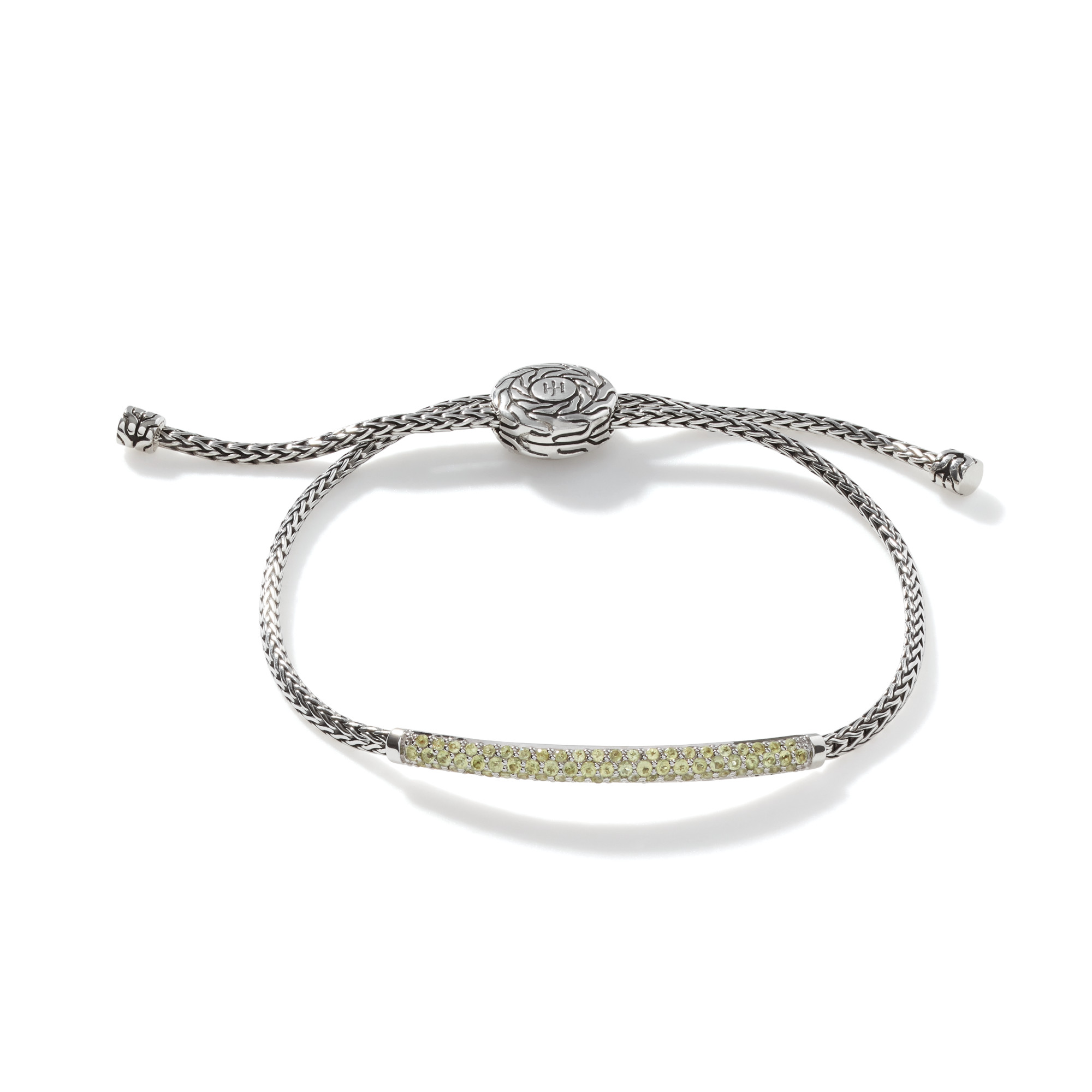 This bracelet by John Hardy is crafted from sterling silver and features peridots.