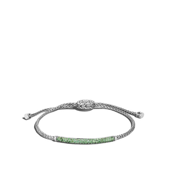 This bracelet by John Hardy is crafted from sterling silver and features emeralds.