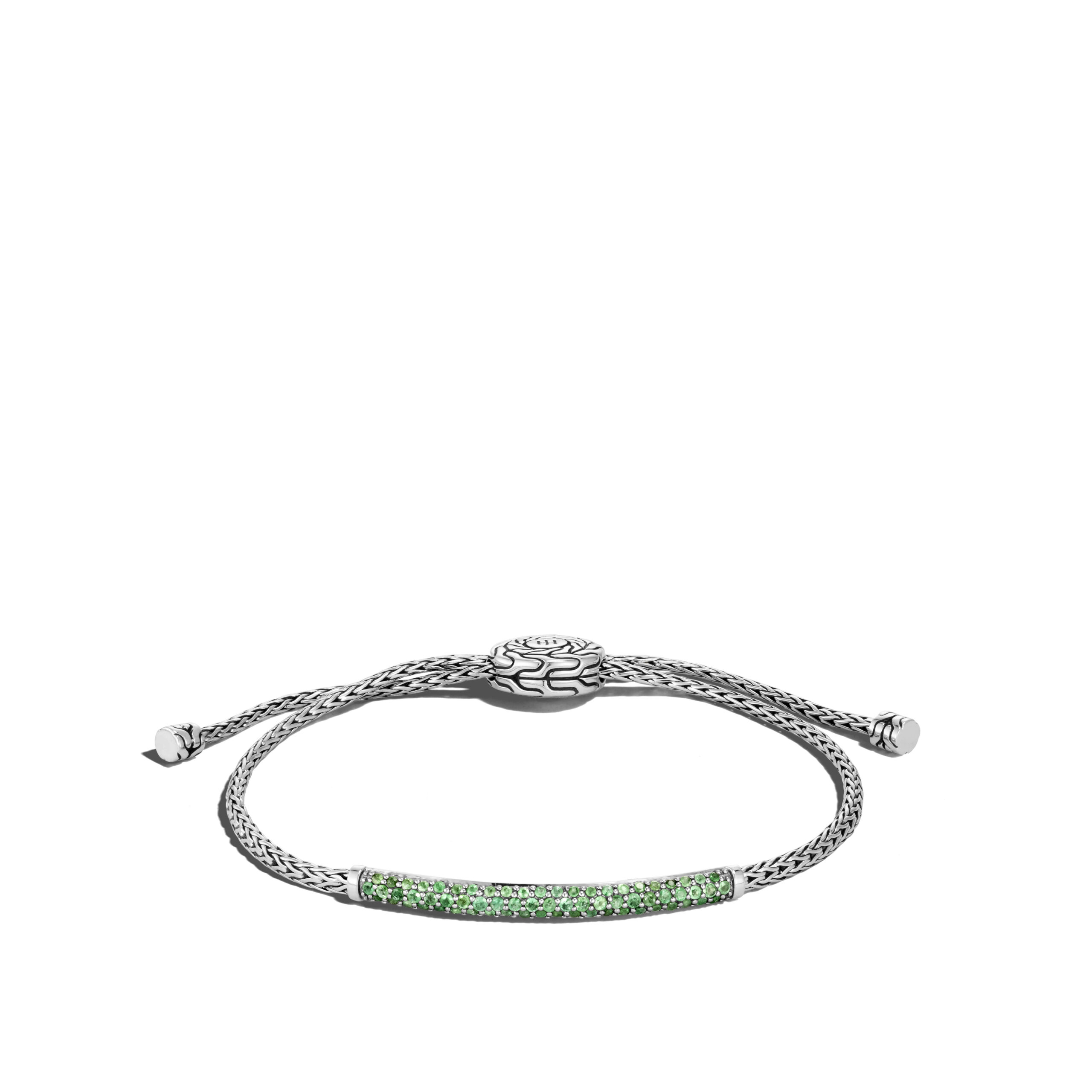 This bracelet by John Hardy is crafted from sterling silver and features emeralds.